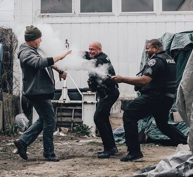 Pepperball LiveX Blast being used by police on aggressor