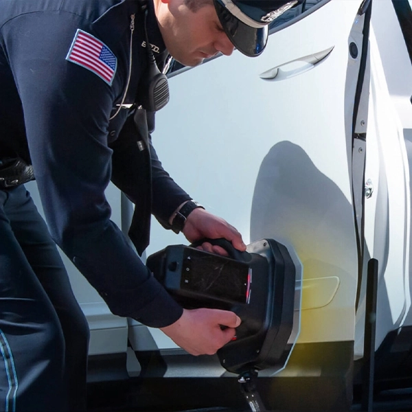 Viken Nighthawk X-ray imager used by police officer to scan vehicle