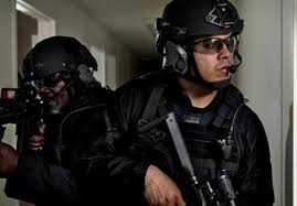 3M Peltor ComTac VIII Headset worn by law enforcement officers