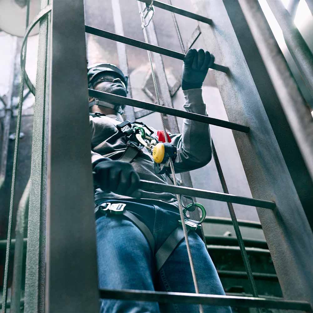 MSA Latchways Vertical Ladder Lifeline Kit in use by industrial worker on ladder