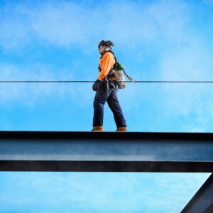 MSA Cable Temporary Horizontal Lifeline in use by construction worker walking along girder