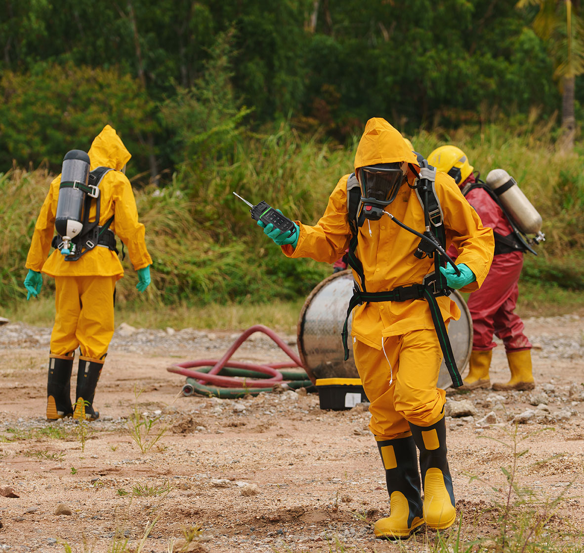 Honeywell ModRAE Portable Gas Detector being used by hazmat responders in a field
